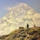 Taustalla jäinen Mount Everest ja Tenzing sitä unelmoimassa.